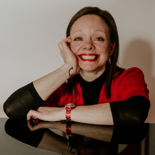 Taylor Giacoma sitting at the piano